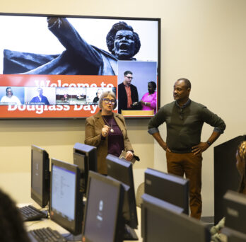 Amy Bailey and Joseph Jewell discuss the Douglass Day transcription event with participants. 